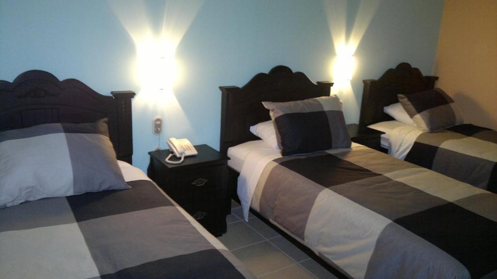 Hotel Eskalima Alajuela Kamer foto